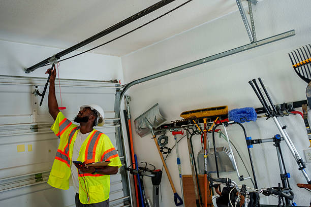 Professional Garage Door Panel Replacement technician working in Love County County, OK